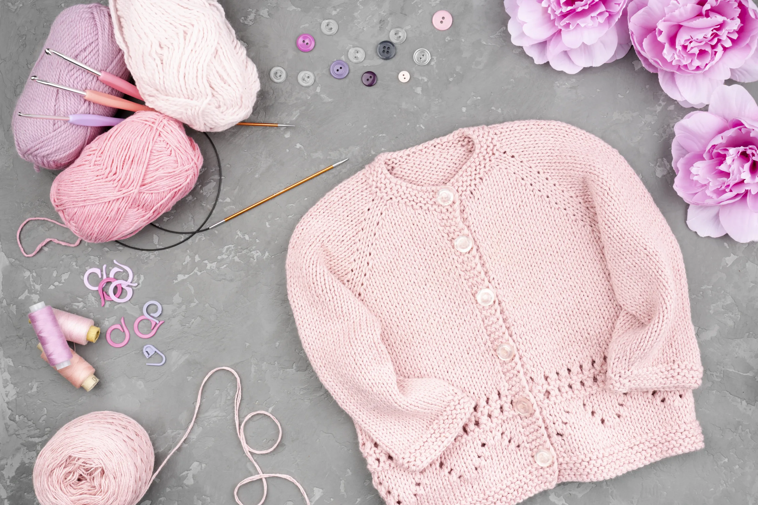 flat-lay-crocheted-pink-jacket